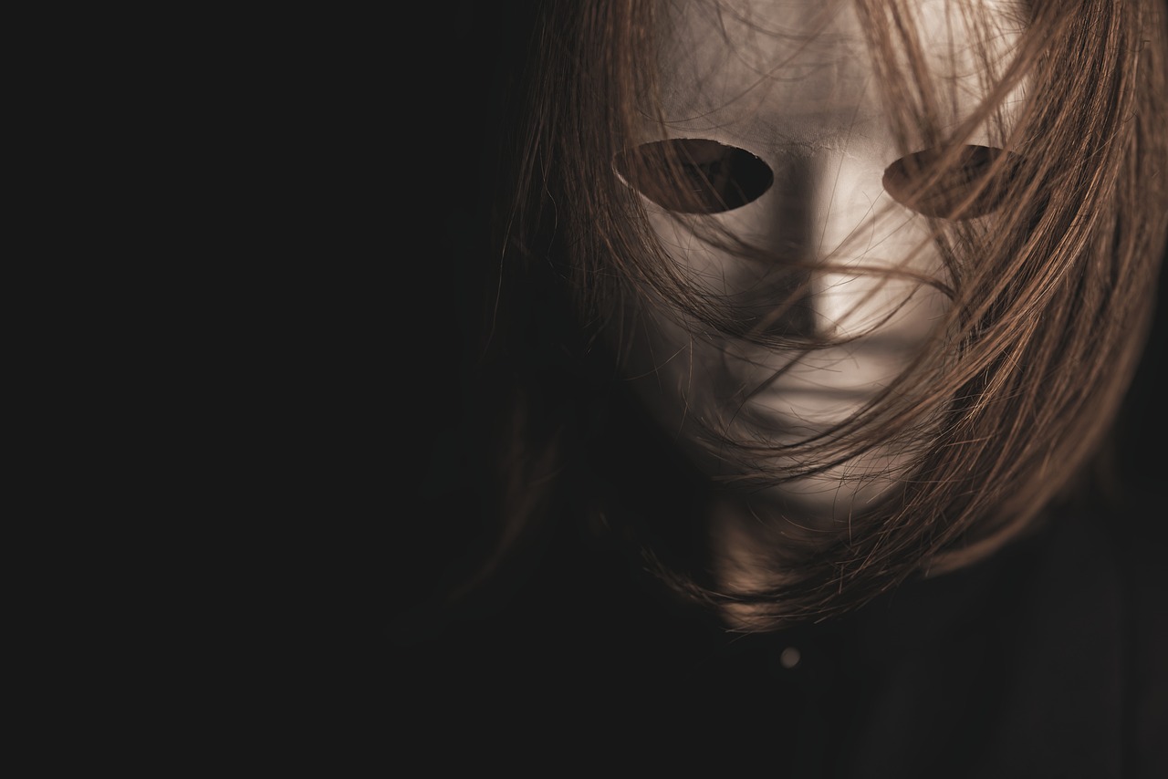 Hidden Face Korean movie – masked woman in shadow