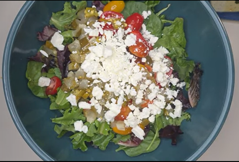Mediterranean Feta Pickle Salad with feta, pickled cucumbers, jalapeños, tomatoes, and mixed greens