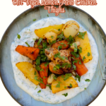 air fryer lemon herb chicken thighs with potatoes carrots and yogurt sauce