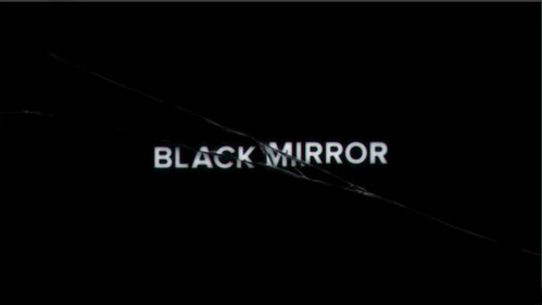 Black Mirror The National Anthem episode title on a cracked black screen