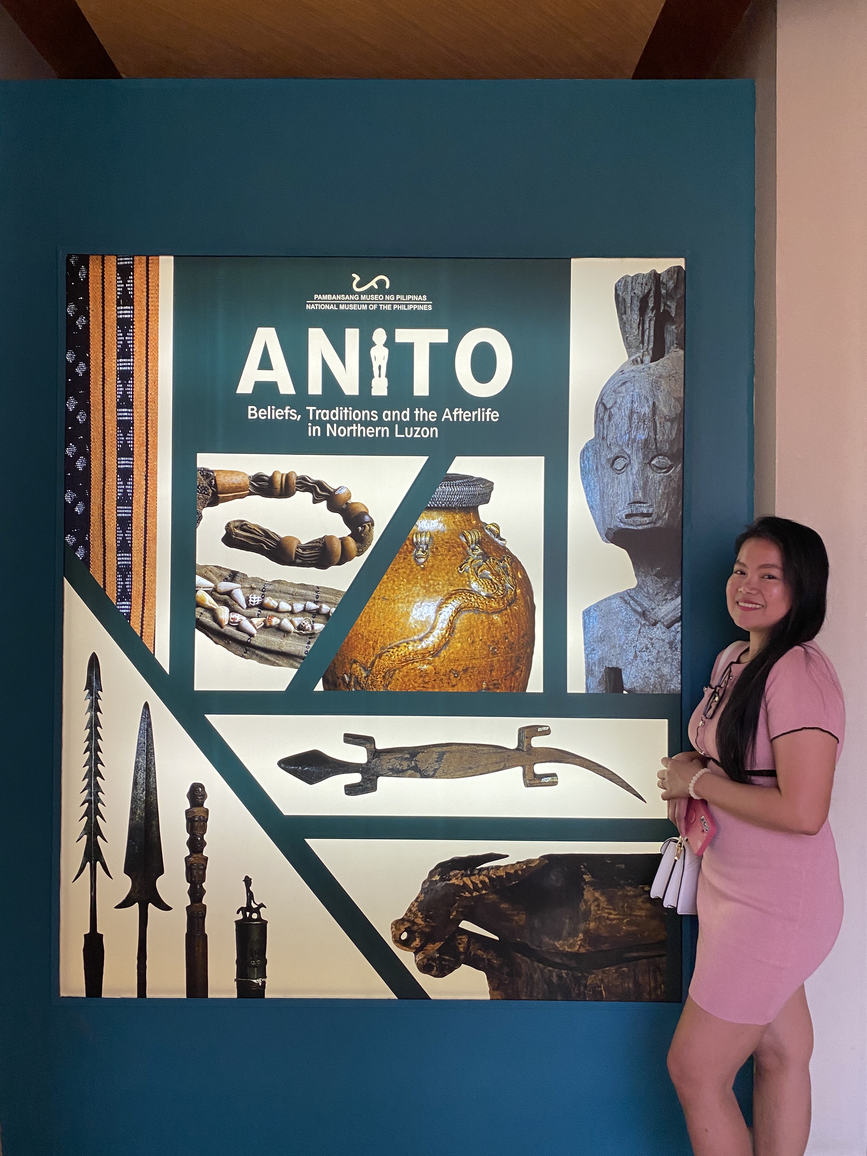 Jezelle posing beside the ANITO exhibit sign at the National Museum of Anthropology in Manila