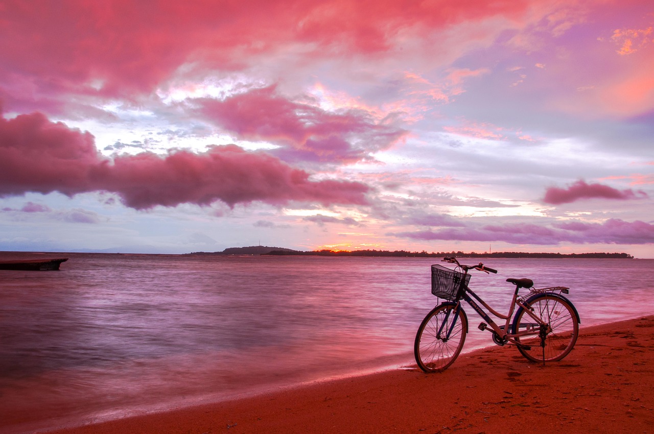 Bicycle on a beach at sunset in the Gili Islands, Indonesia
