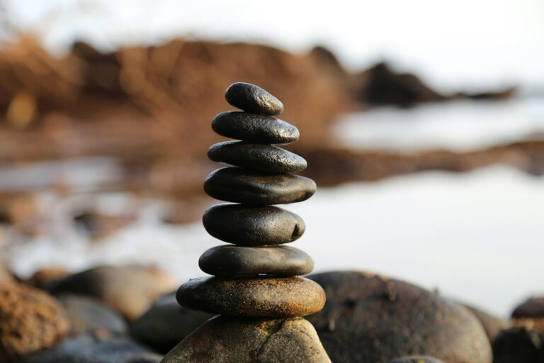 Deep Work by Cal Newport – balanced stones symbolizing focus, calm, and concentration