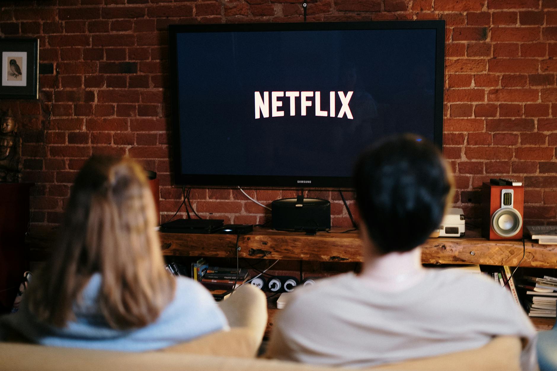 Couple watching the Nowhere 2023 movie on Netflix at home
